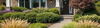 Front yard landscaping for privacy without fences using layered shrubs, grasses, and a small tree to screen windows while keeping the entry open